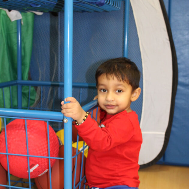 A child in a gymnasium.