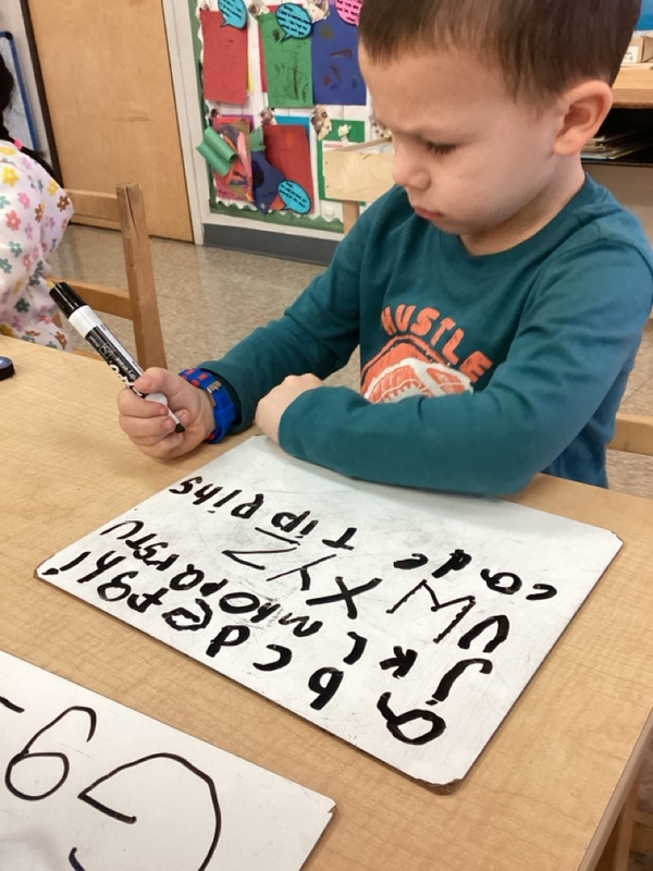 child writing.
