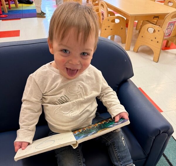 child reading book.