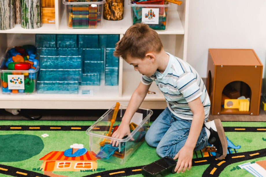 boy playing in classroom.