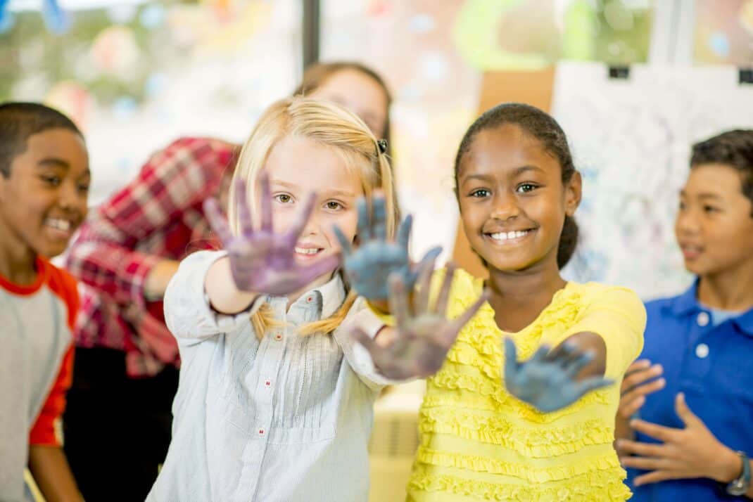 Preschool teacher and children at a daycare in Avon Indiana